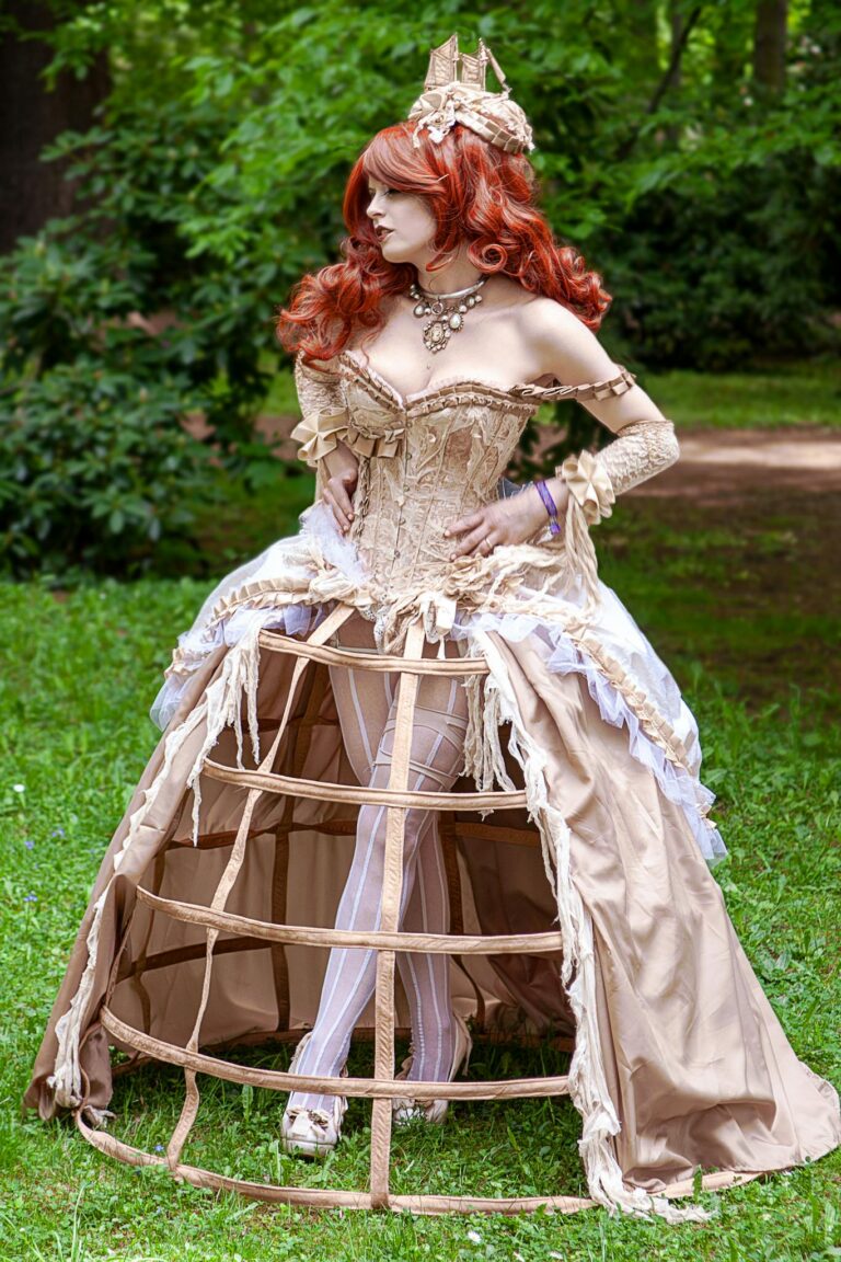 A woman dressed in a corset and high heels